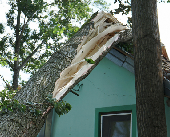 Damaged Residential Roof Due to Florida Hurricane Surge.